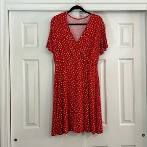 Red patterned dress. Faux wrap